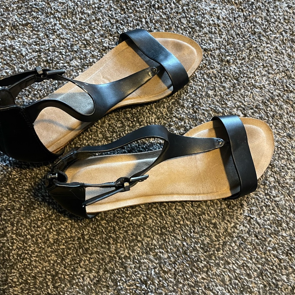 Sleek Black Sandals with Shiny Straps and Wedge Heel